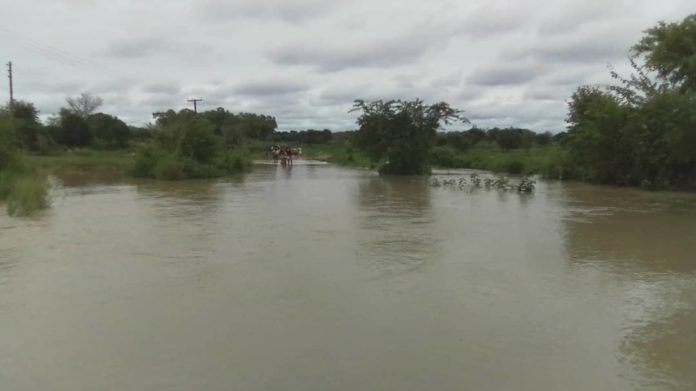 FLOODED ROAD IN NYARIGA