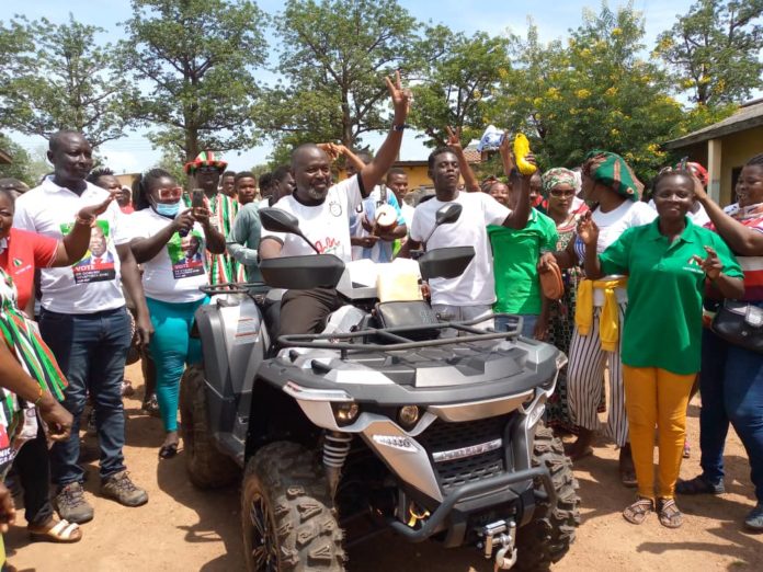 DR. DOMINIC AYINE ON MOTORBIKE