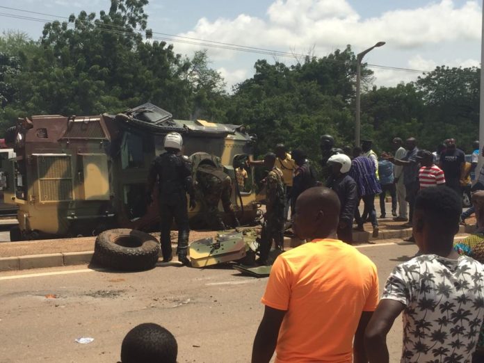 MILITARY ARMOURED CAR INVOLVED IN ACCIDENT