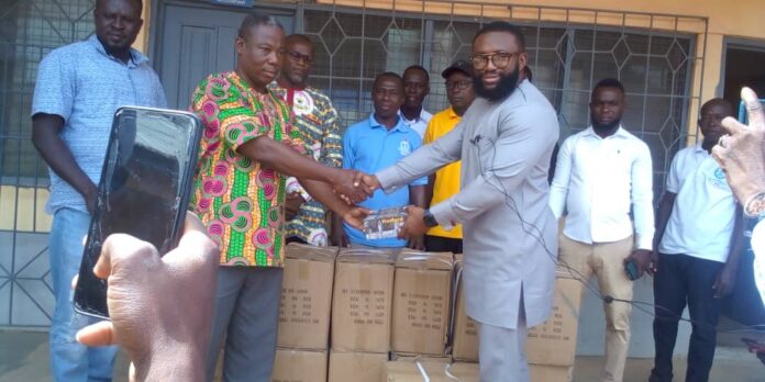 Mr. Ndebah donating mathematical sets to schools in Bawku West District