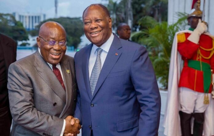 Nana Addo Dankwa Akufo-Addo (left) in handshake with Alassane Ouattara (right)