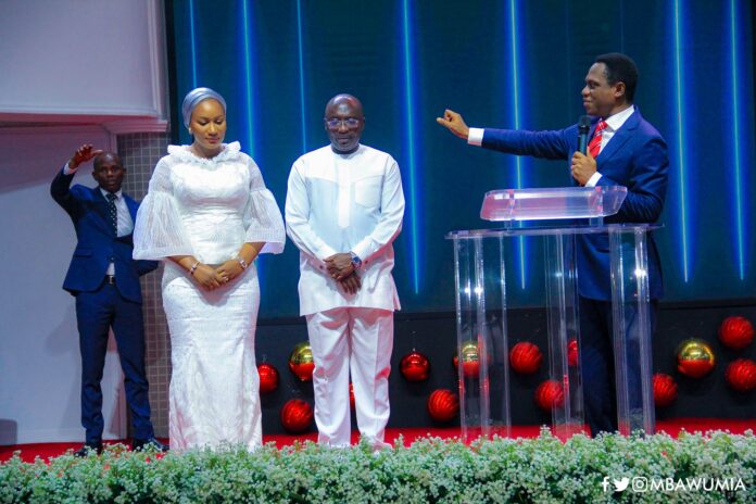 Dr. Mahamudu Bawumia (middle in white) and his wife Samira Bawumia at a church service