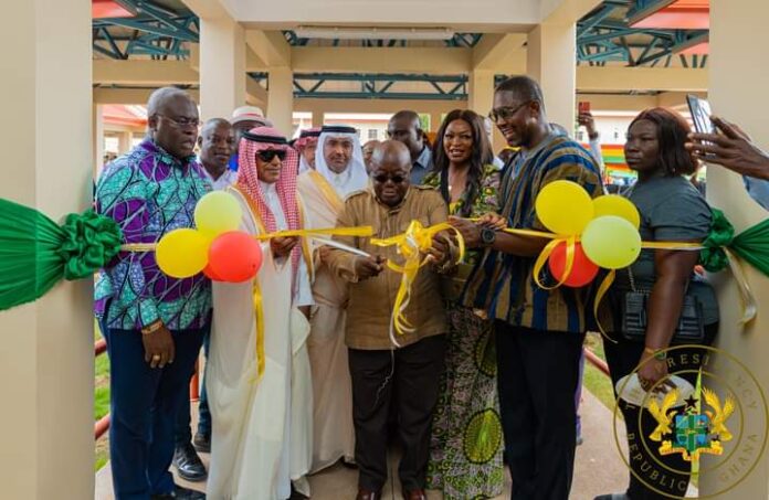 Representative of the Saudi Fund for Development (left), president Akufo-Addo (middle) and Health Minister, Bernard Okoe-Boye (right in smoke)