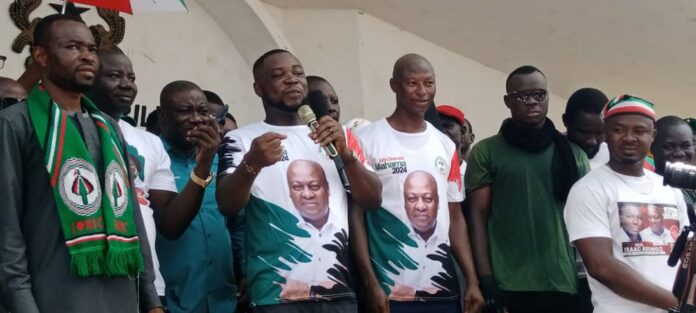 Francis Ayadago was welcomed by officials of the NDC into the party