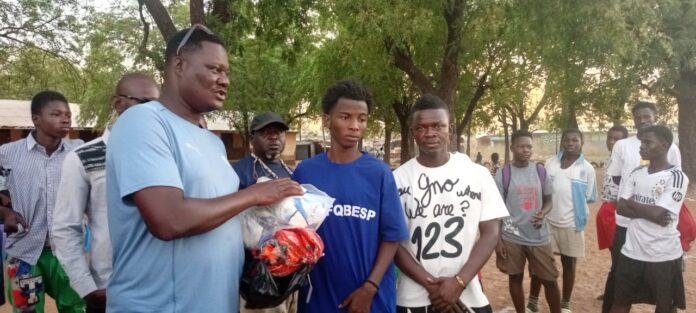 Coach Salifu Fatawu speaking before presenting kits to Liberty FC