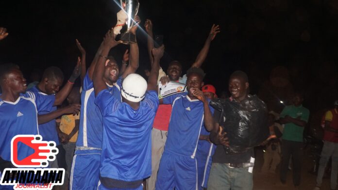 Meehiboug lifts trophy in celebration of their victory